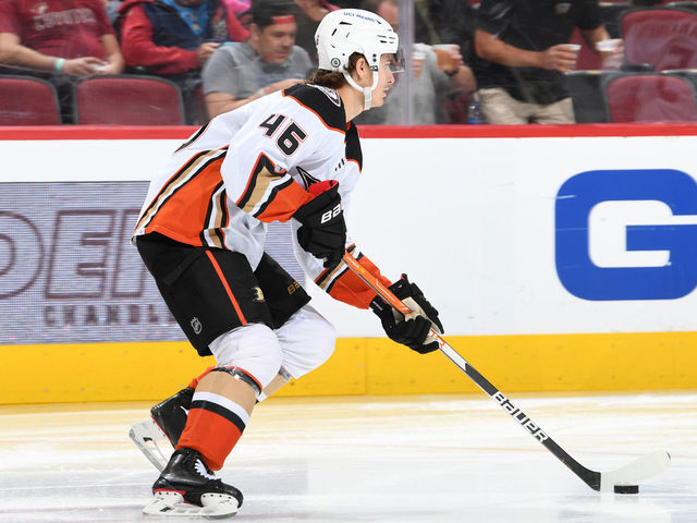 GLENDALE, ARIZONA - APRIL 01: Trevor Zegras #46 of the Anaheim Ducks skates with the puck against the Arizona Coyotes at Gila River Arena on April 01, 2022 in Glendale, Arizona.