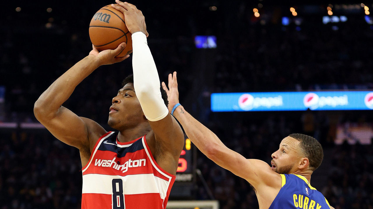 SAN FRANCISCO, CALIFORNIA - MARCH 14: Rui Hachimura #8 of the Washington Wizards shoots the ball while guarded by Stephen Curry #30 of the Golden State Warriors in the first half at Chase Center on March 14, 2022 in San Francisco, California. NOTE TO USER: User expressly acknowledges and agrees that, by downloading and/or using this photograph, User is consenting to the terms and conditions of the Getty Images License Agreement.
