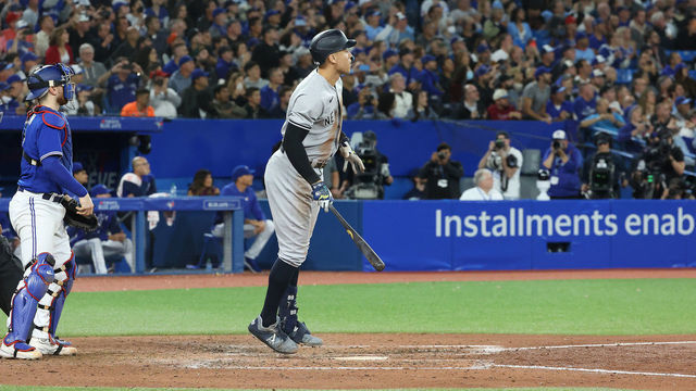 TORONTO, ON - SEPTEMBER 28 - New York Yankees designated hitter Aaron Judge (99) hits his 61st home run, a two run shot, of the season to tie Roger Maris as the Toronto Blue Jays play the New York Yankees at Rogers Centre in Toronto. September 28, 2022. (Steve Russell/Toronto Star via Getty Images)