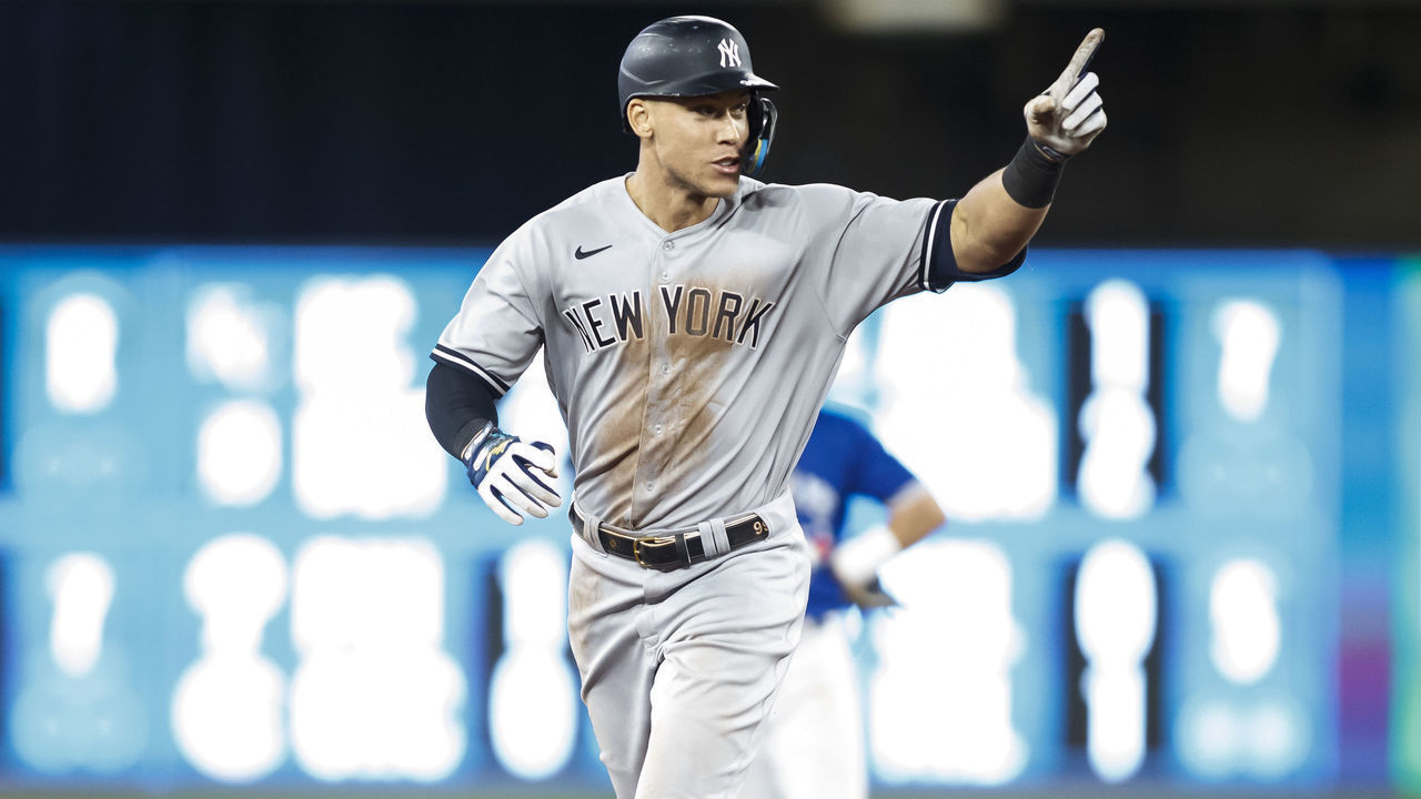 TORONTO, ON - SEPTEMBER 28: Aaron Judge #99 of the New York Yankees runs the bases as he hits his 61st home run of the season in the seventh inning against the Toronto Blue Jays at Rogers Centre on September 28, 2022 in Toronto, Ontario, Canada. Judge has now tied Roger Maris for the American League record.