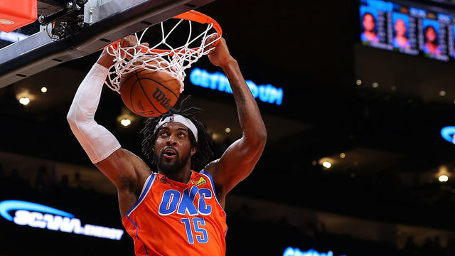 ATLANTA, GEORGIA - NOVEMBER 22: Derrick Favors #15 of the Oklahoma City Thunder dunks against Kevin Huerter #3 of the Atlanta Hawks during the first half at State Farm Arena on November 22, 2021 in Atlanta, Georgia.