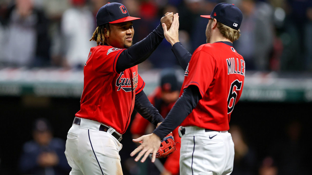 CLEVELAND, OH - SEPTEMBER 29: Cleveland Guardians third baseman Jose Ramirez (11) and Cleveland Guardians designated hitter Owen Miller (6) celebrate following the Major League Baseball game between the Tampa Bay Rays and Cleveland Guardians on September 29, 2022, at Progressive Field in Cleveland, OH.