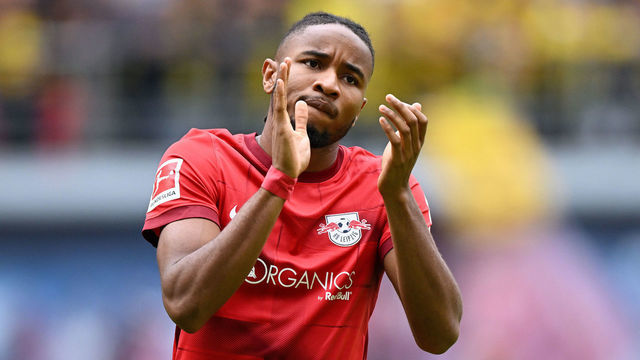 LEIPZIG, GERMANY - SEPTEMBER 10: Christopher Nkunku of RB Leipzig applauds the fans during the Bundesliga match between RB Leipzig and Borussia Dortmund at Red Bull Arena on September 10, 2022 in Leipzig, Germany.