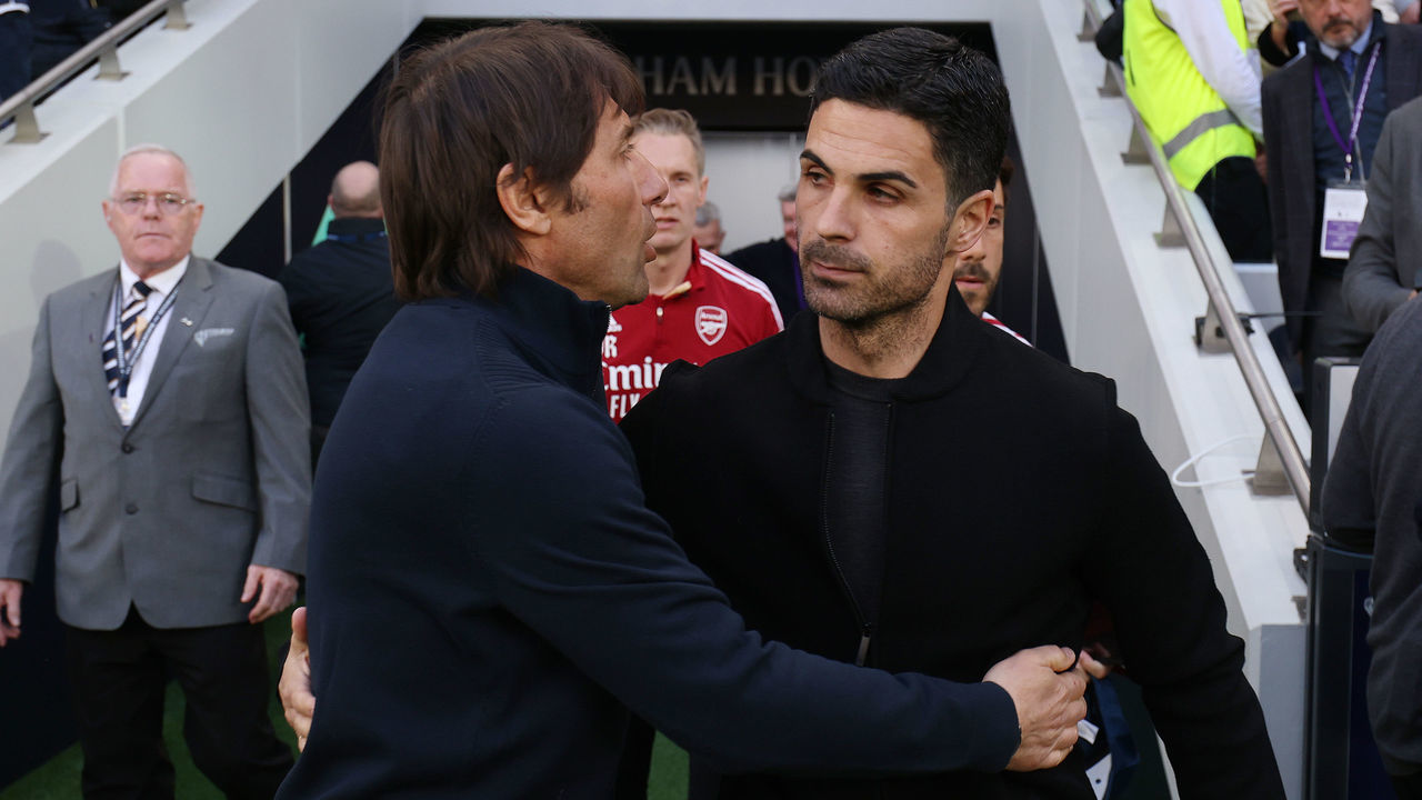 LONDON, ENGLAND - MAY 12: Antonio Conte, Manager of Tottenham Hotspur embraces Mikel Arteta, Manager of Arsenal prior to the Premier League match between Tottenham Hotspur and Arsenal at Tottenham Hotspur Stadium on May 12, 2022 in London, England.