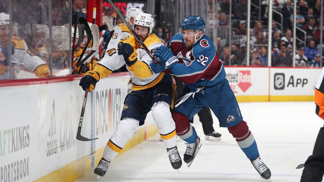 DENVER, COLORADO - MAY 05: Gabriel Landeskog #92 of the Colorado Avalanche skates against Roman Josi #59 of the Nashville Predators in Game Two of the First Round of the 2022 Stanley Cup Playoffs at Ball Arena on May 5, 2022 in Denver, Colorado.