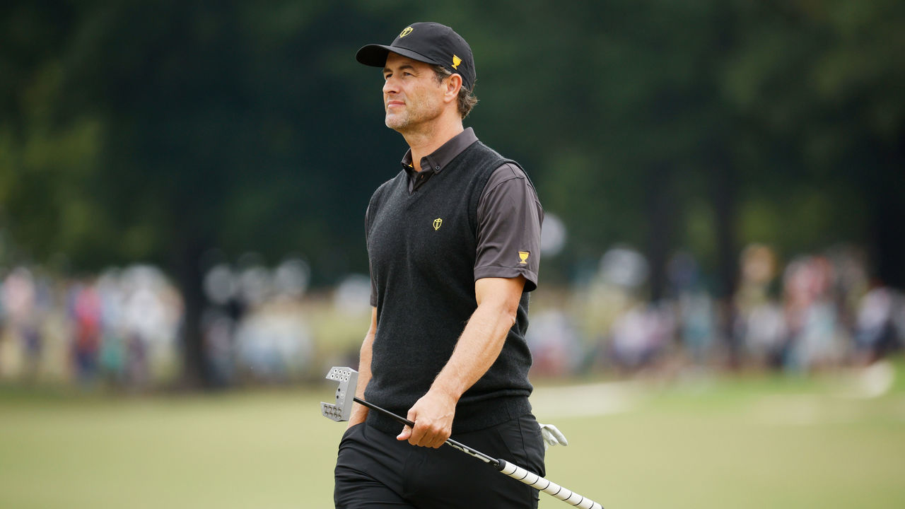 CHARLOTTE, NORTH CAROLINA - SEPTEMBER 25: Adam Scott of Australia and the International Team walks the seventh green during Sunday singles matches on day four of the 2022 Presidents Cup at Quail Hollow Country Club on September 25, 2022 in Charlotte, North Carolina.