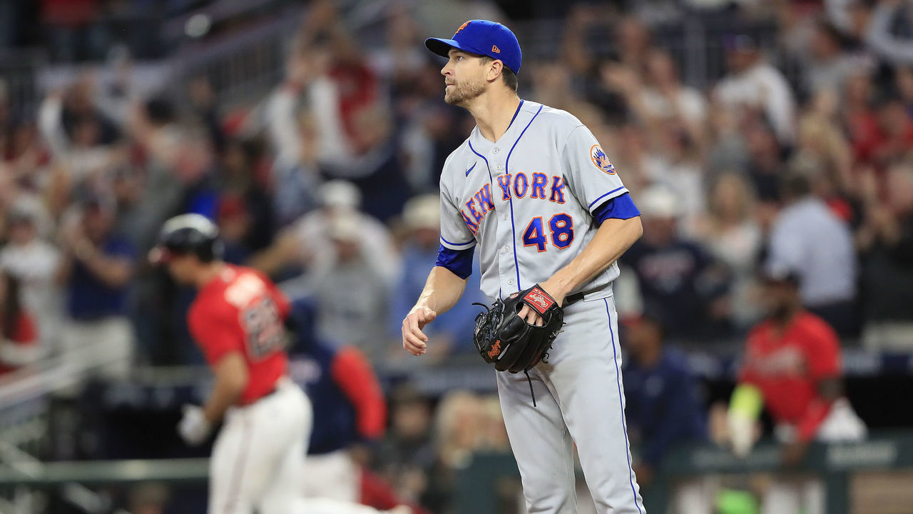 ATLANTA, GA - SEPTEMBER 30: New York Mets starting pitcher Jacob deGrom (48) reacts after giving up a home run to Braves first baseman Matt Olson (28) during the Friday evening MLB game between the New York Mets and the Atlanta Braves on September 30, 2022 at Truist Park in Atlanta, Georgia.