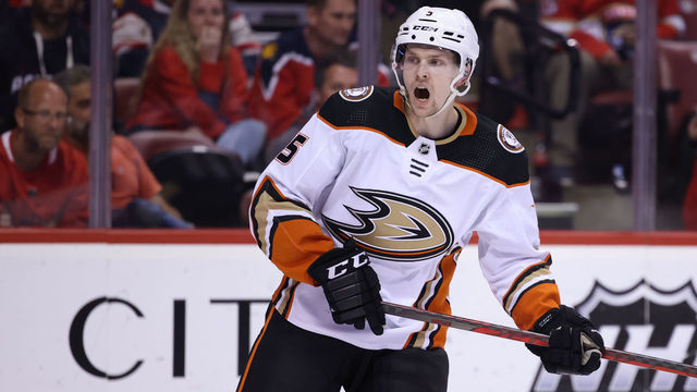 MIAMI, FL - April 12: Anaheim Ducks defenseman Urho Vaakanainen (5) shouts to a teammate during the game between the Anaheim Ducks and the Florida Panthers on Tuesday, April 12, 2022 at the FLA Live Arena in Sunrise, FL