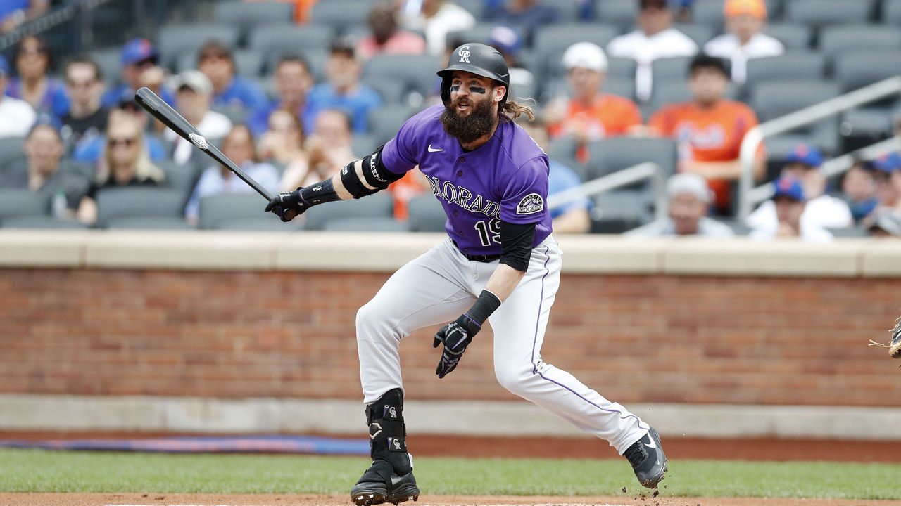NEW YORK, NEW YORK - AUGUST 28: Charlie Blackmon #19 of the Colorado Rockies first inning base hit against the New York Mets at Citi Field on August 28, 2022 in New York City. The Rockies defeated the Mets 1-0.
