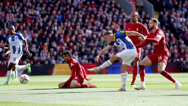 LIVERPOOL, ENGLAND - OCTOBER 01: Leandro Trossard of Brighton & Hove Albion scores their sides first goal during the Premier League match between Liverpool FC and Brighton & Hove Albion at Anfield on October 01, 2022 in Liverpool, England.