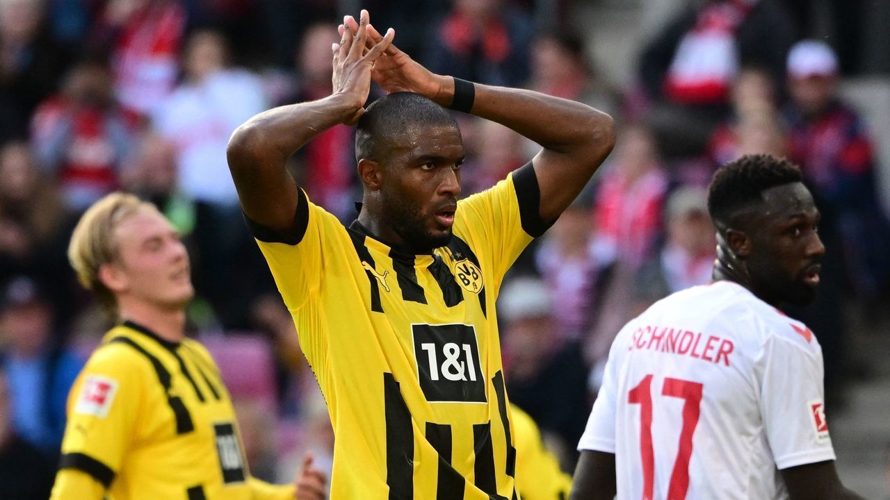 Dortmund's French forward Anthony Modeste reacts during the German first division Bundesliga football match between FC Cologne and Borussia Dortmund in Cologne on October 1, 2022. - DFL REGULATIONS PROHIBIT ANY USE OF PHOTOGRAPHS AS IMAGE SEQUENCES AND/OR QUASI-VIDEO