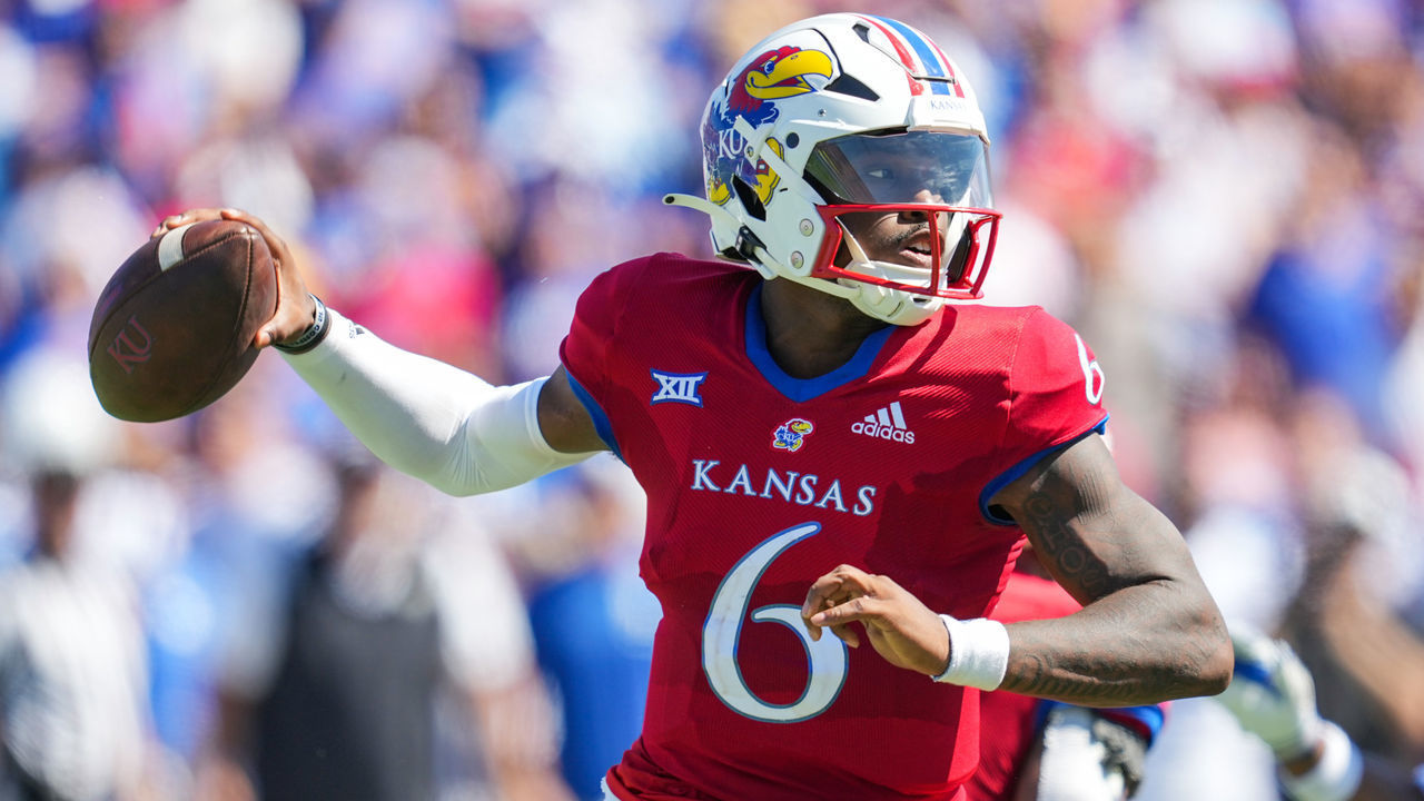 LAWRENCE, KS - SEPTEMBER 24: Jalon Daniels #6 of the Kansas Jayhawks throws a pass during the second half against the Duke Blue Devils at David Booth Kansas Memorial Stadium on September 24, 2022 in Lawrence, Kansas. Kansas defeated Duke 35-27.