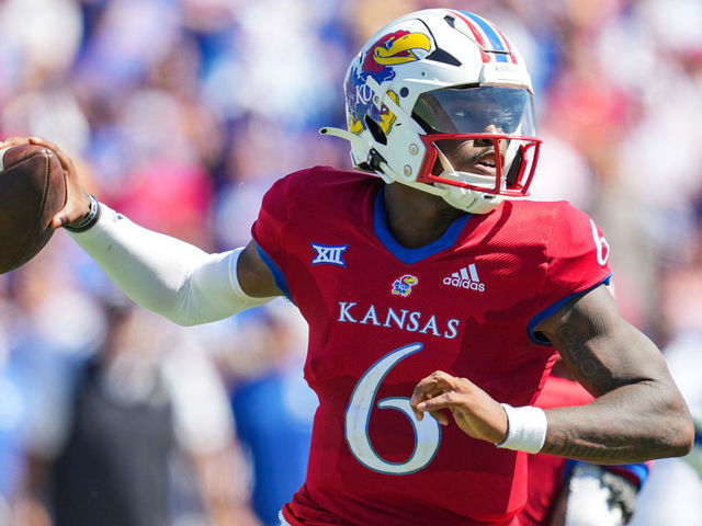 LAWRENCE, KS - SEPTEMBER 24: Jalon Daniels #6 of the Kansas Jayhawks throws a pass during the second half against the Duke Blue Devils at David Booth Kansas Memorial Stadium on September 24, 2022 in Lawrence, Kansas. Kansas defeated Duke 35-27.