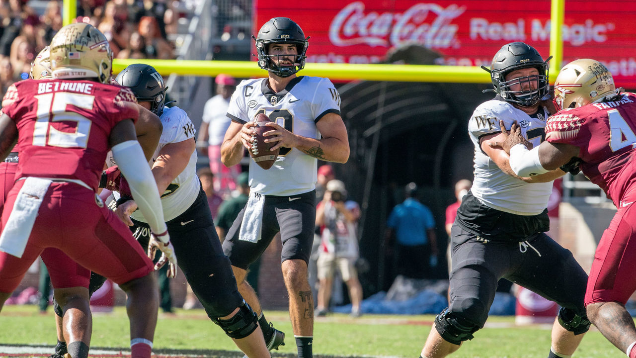 TALLAHASSEE, FL - OCTOBER 01: Wake Forest Demon Deacons quarterback Sam Hartman (10) looks to pass during a college football game between the Wake Forest Demon Deacons and the Florida State Seminoles on October 01, 2022, at at Bobby Bowden Field At Doak Campbell Stadium in Tallahassee, FL.