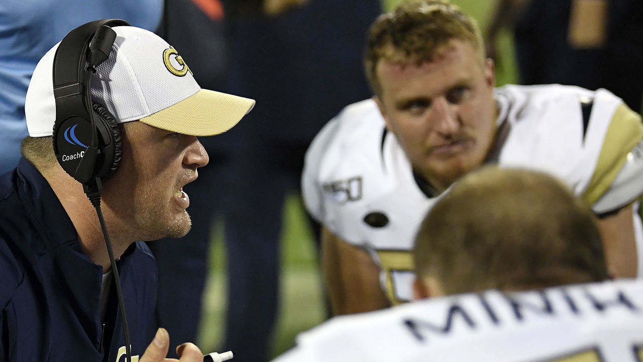 CLEMSON, SOUTH CAROLINA - AUGUST 29: Georgia Tech Yellow Jackets assistant head coach Brent Key meets with Yellow Jacket players during their football game against the Clemson Tigers at Memorial Stadium on August 29, 2019 in Clemson, South Carolina.