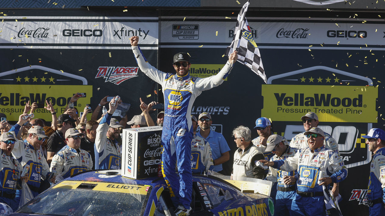 TALLADEGA, ALABAMA - OCTOBER 02: Chase Elliott, driver of the #9 NAPA Auto Parts Chevrolet, celebrates in victory lane after winning the NASCAR Cup Series YellaWood 500 at Talladega Superspeedway on October 02, 2022 in Talladega, Alabama.