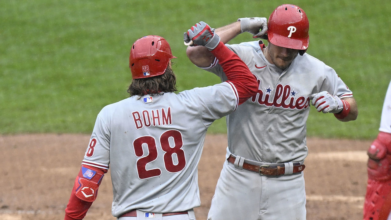 WASHINGTON, DC - OCTOBER 02: J.T. Realmuto #10 of the Philadelphia Phillies celebrates with Alec Bohm #28 after hitting a home run in the sixth inning against the Washington Nationals at Nationals Park on October 02, 2022 in Washington, DC.