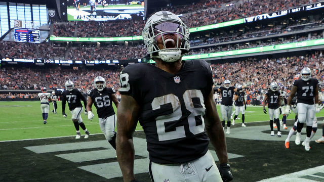 LAS VEGAS, NEVADA - OCTOBER 02: Josh Jacobs #28 of the Las Vegas Raiders celebrates after scoring a touchdown in the fourth quarter against the Denver Broncos at Allegiant Stadium on October 02, 2022 in Las Vegas, Nevada.