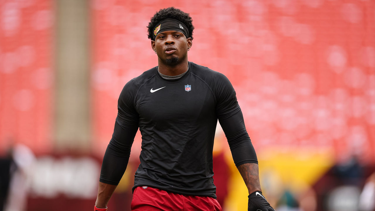 LANDOVER, MD - SEPTEMBER 25: Brian Robinson #8 of the Washington Commanders warms up before the game against the Philadelphia Eagles at FedExField on September 25, 2022 in Landover, Maryland. Robinson was shot twice in the leg during an attempted robbery on August 28, 2022.