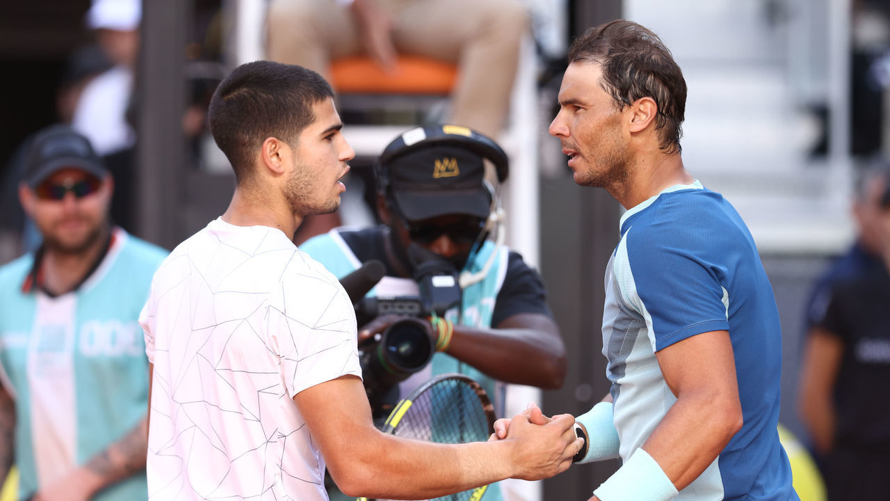 MADRID, SPAIN - MAY 06: Carlos Alcaraz of Spain saludates to Rafael Nadal of Spain after winning during the Mutua Madrid Open 2022 celebrated at La Caja Magica on May 06, 2022, in Madrid, Spain.