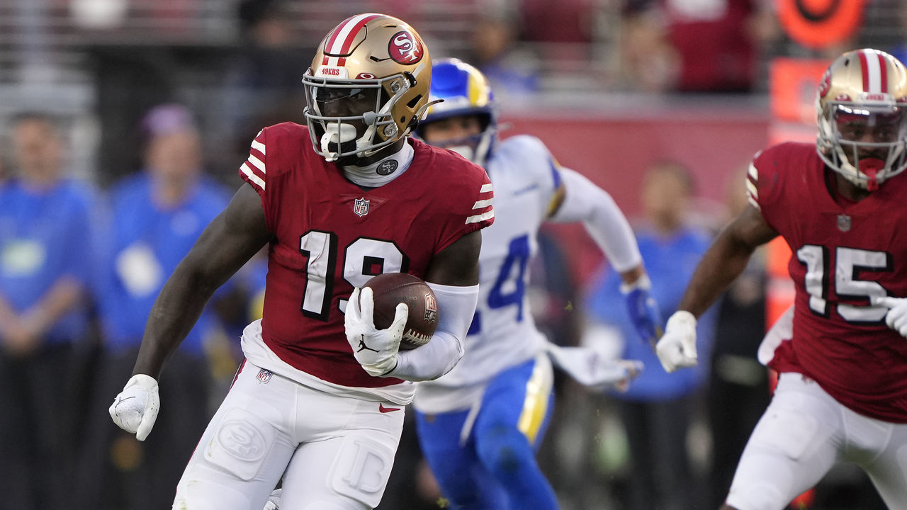 SANTA CLARA, CALIFORNIA - OCTOBER 03: Wide receiver Deebo Samuel #19 of the San Francisco 49ers rushes for a touchdown against the Los Angeles Rams during the second quarter at Levi's Stadium on October 03, 2022 in Santa Clara, California.