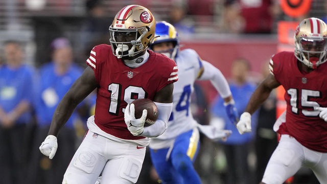 SANTA CLARA, CALIFORNIA - OCTOBER 03: Wide receiver Deebo Samuel #19 of the San Francisco 49ers rushes for a touchdown against the Los Angeles Rams during the second quarter at Levi's Stadium on October 03, 2022 in Santa Clara, California.