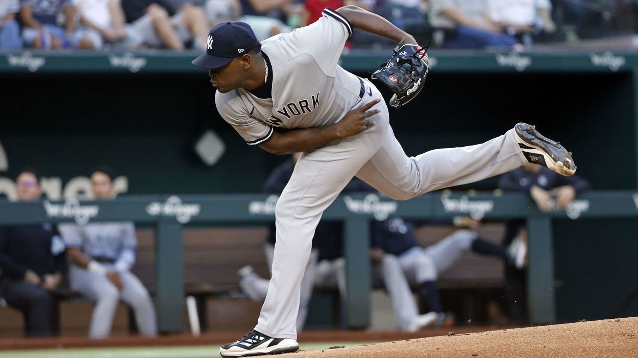 ARLINGTON, TX - OCTOBER 3: Luis Severino #40 of the New York Yankees delivers against the Texas Rangers during the first inning at Globe Life Field on October 3, 2022 in Arlington, Texas.