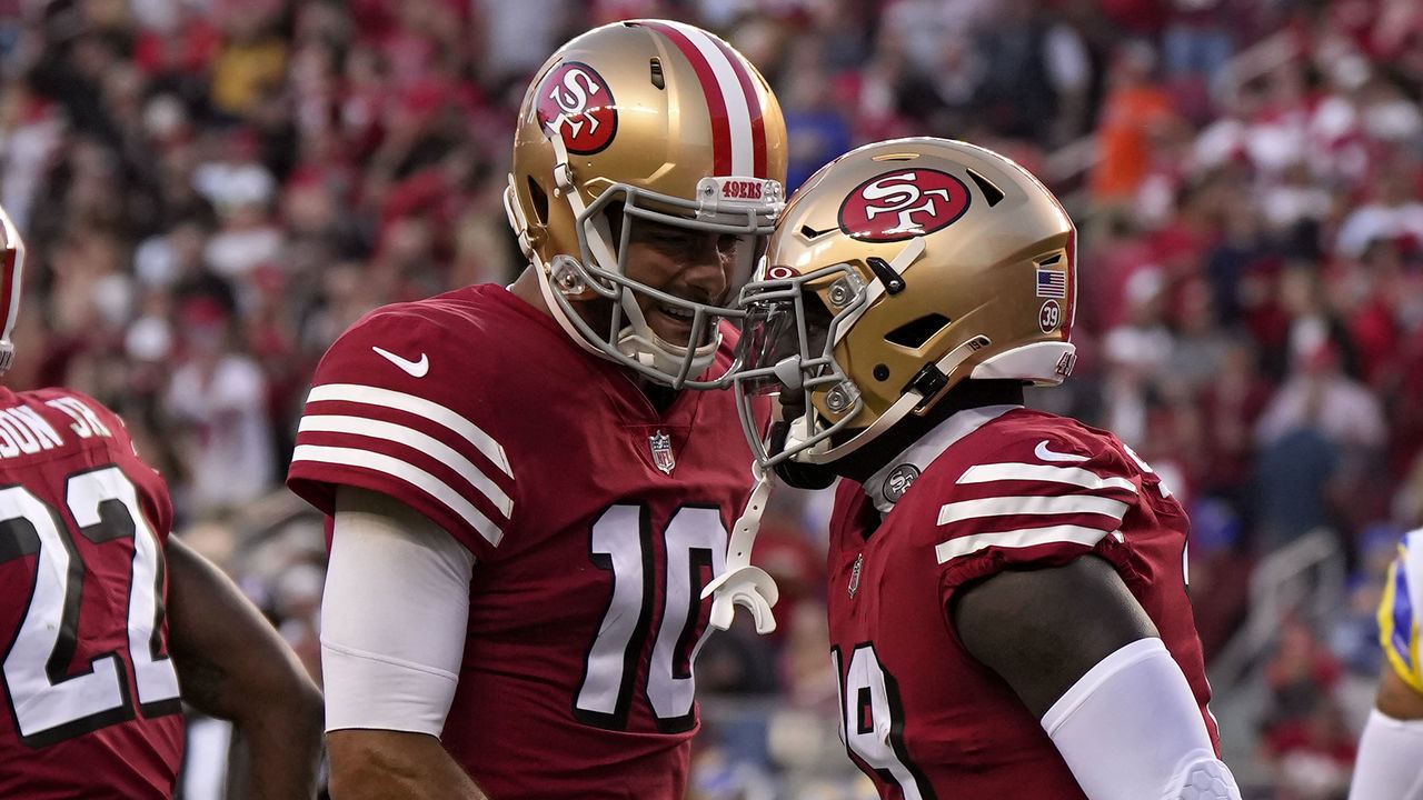 SANTA CLARA, CALIFORNIA - OCTOBER 03: Wide receiver Deebo Samuel #19 of the San Francisco 49ers celebrates with teammate quarterback Jimmy Garoppolo #10 after rushing for a touchdown against the Los Angeles Rams during the second quarter at Levi's Stadium on October 03, 2022 in Santa Clara, California.
