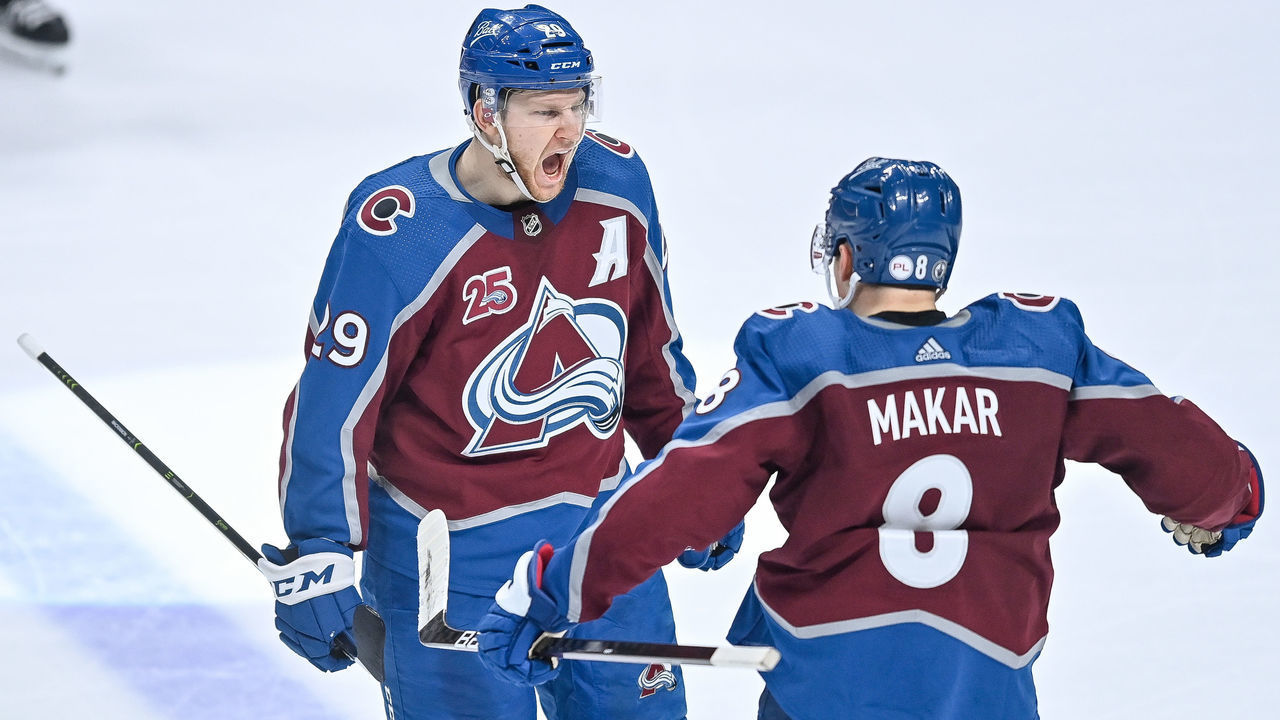 DENVER, CO - MAY 19: Colorado Avalanche center Nathan MacKinnon (29) celebrates with defenseman Cale Makar (8) after scoring a third period goal against the St. Louis Blues during a Stanley Cup Playoffs first round game between the St. Louis Blues and the Colorado Avalanche at Ball Arena in Denver, Colorado on May 19, 2021.