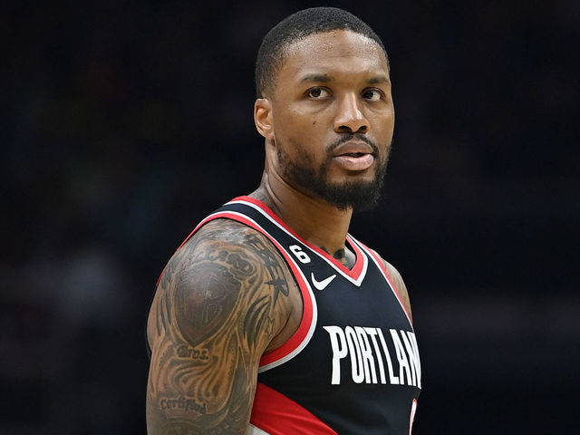 SEATTLE, WASHINGTON - OCTOBER 03: Damian Lillard #0 of the Portland Trail Blazers looks on during the first half of a preseason game against the Los Angeles Clippers at Climate Pledge Arena on October 03, 2022 in Seattle, Washington. The Los Angeles Clippers won 102-97.