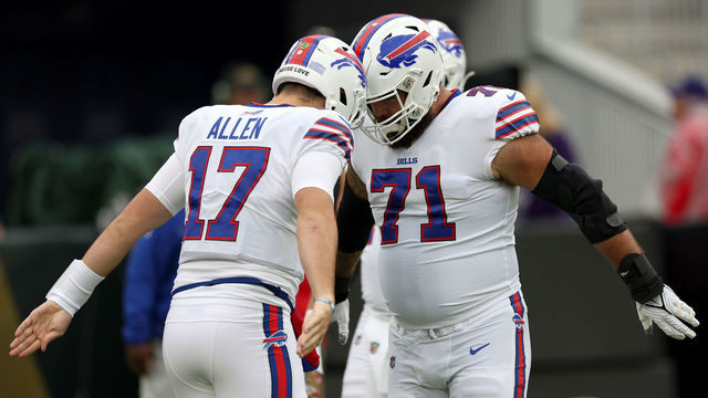 BALTIMORE, MARYLAND - OCTOBER 02: Quarterback Josh Allen #17 and offensive tackle Ryan Bates #71 of the Buffalo Bills warms up against the Baltimore Ravens at M&T Bank Stadium on October 02, 2022 in Baltimore, Maryland.