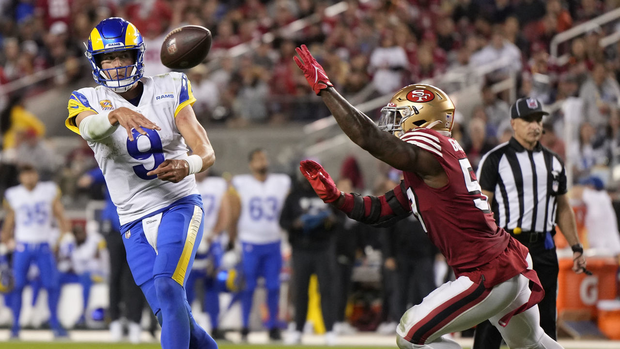 SANTA CLARA, CALIFORNIA - OCTOBER 03: Quarterback Matthew Stafford #9 of the Los Angeles Rams passes against the San Francisco 49ers during the third quarter at Levi's Stadium on October 03, 2022 in Santa Clara, California.