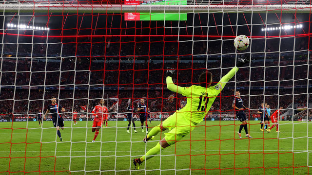 MUNICH, GERMANY - OCTOBER 04: Leroy Sane of Bayern Munich scores their team's first goal past Marian Tvrdon of FC Viktoria Plzen during the UEFA Champions League group C match between FC Bayern München and Viktoria Plzen at Allianz Arena on October 04, 2022 in Munich, Germany.