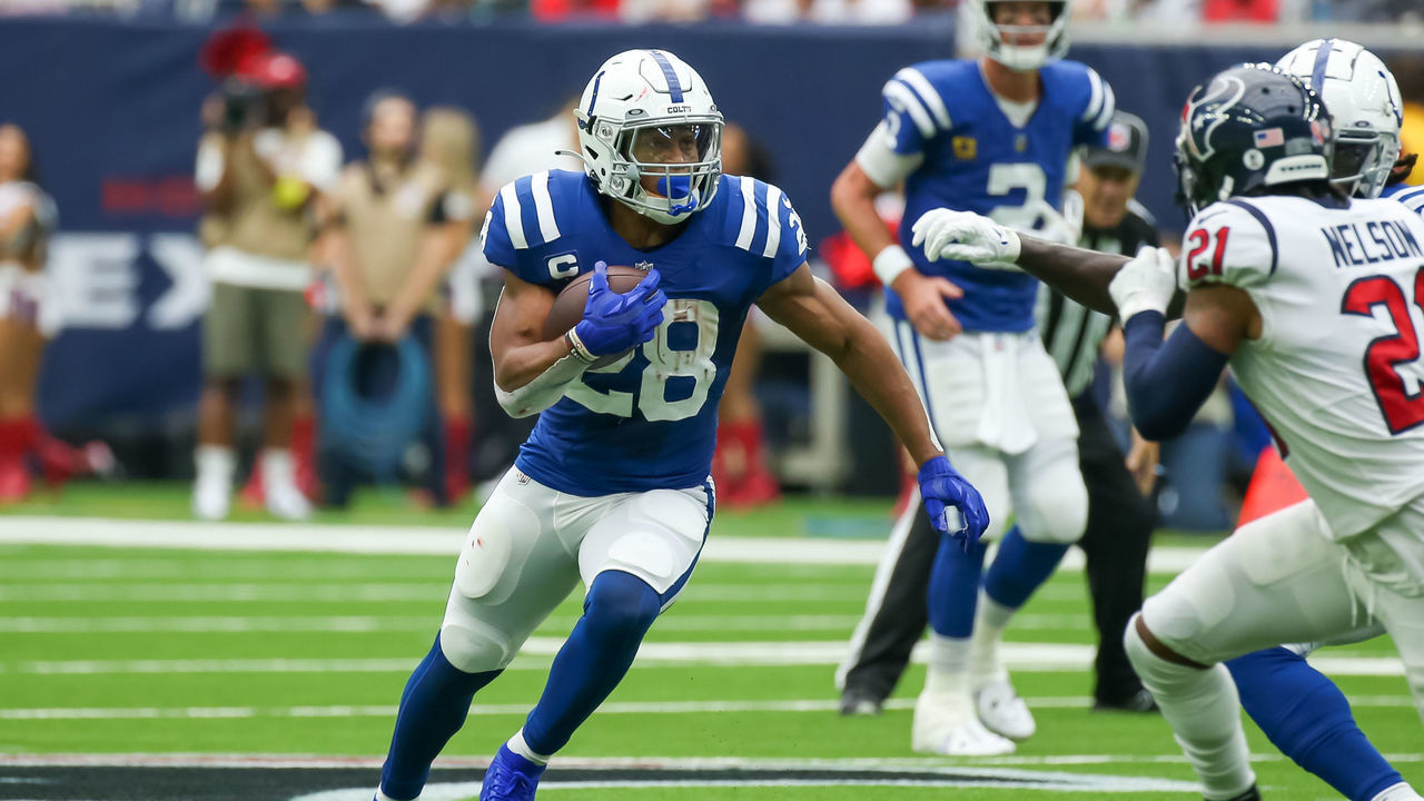 HOUSTON, TX - SEPTEMBER 11: Indianapolis Colts running back Jonathan Taylor (28) carries the ball in the first quarter during the NFL game between the Indianapolis Colts and Houston Texans on September 11, 2022 at NRG Stadium in Houston, Texas.