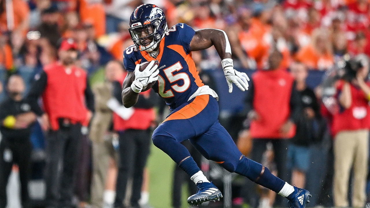 DENVER, CO - SEPTEMBER 25: Denver Broncos running back Melvin Gordon III (25) carries the ball for a first down gain during a game between the San Francisco 49ers and the Denver Broncos at Empower Field at Mile High on September 25, 2022 in Denver, Colorado.