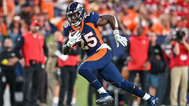 DENVER, CO - SEPTEMBER 25: Denver Broncos running back Melvin Gordon III (25) carries the ball for a first down gain during a game between the San Francisco 49ers and the Denver Broncos at Empower Field at Mile High on September 25, 2022 in Denver, Colorado.