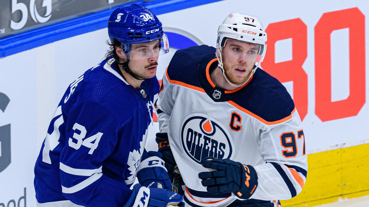 TORONTO, ON - MARCH 29: Toronto Maple Leafs Center Auston Matthews (34) and Edmonton Oilers Center Connor McDavid (97) react during the second period of the NHL regular season game between the Edmonton Oilers and the Toronto Maple Leafs on March 29, 2021, at Scotiabank Arena in Toronto, ON, Canada.