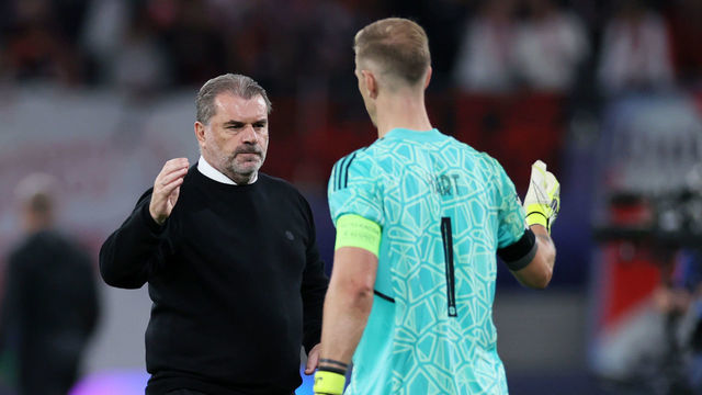 LEIPZIG, GERMANY - OCTOBER 05: Joe Hart embraces Angelos Postecoglou, Manager of Celtic after their sides defeat during the UEFA Champions League group F match between RB Leipzig and Celtic FC at Red Bull Arena on October 05, 2022 in Leipzig, Germany.