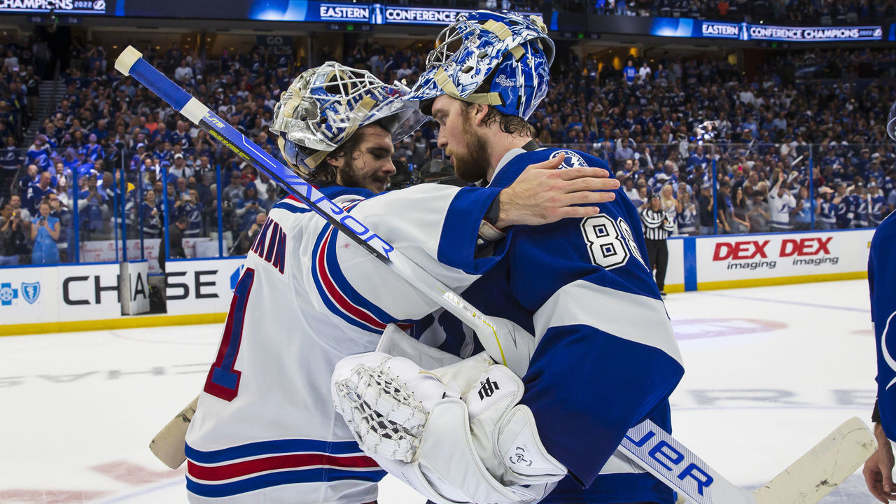 TAMPA, FL - JUNE 11: Goalie Andrei Vasilevskiy #88 of the Tampa Bay Lightning shakes hands with Igor Shesterkin #31 of the New York Rangers after Game Six of the Eastern Conference Final of the 2022 Stanley Cup Playoffs at Amalie Arena on June 11, 2022 in Tampa, Florida.
