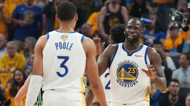 SAN FRANCISCO, CA - JUNE 13: Draymond Green #23 hi-fives Jordan Poole #3 of the Golden State Warriors during Game Five of the 2022 NBA Finals on June 13, 2022 at Chase Center in San Francisco, California. NOTE TO USER: User expressly acknowledges and agrees that, by downloading and or using this photograph, user is consenting to the terms and conditions of Getty Images License Agreement. Mandatory Copyright Notice: Copyright 2022 NBAE