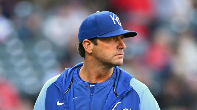 CLEVELAND, OHIO - OCTOBER 05: Manager Mike Matheny #22 of the Kansas City Royals walks back to the dugout after a mound visit during the seventh inning against the Cleveland Guardians at Progressive Field on October 05, 2022 in Cleveland, Ohio.