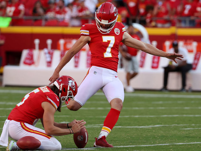 KANSAS CITY, MO - AUGUST 25: Kansas City Chiefs place kicker Harrison Butker (7) kicks a field goal before an NFL preseason game between the Green Bay Packers and Kansas City Chiefs on August 25, 2022 at GEHA Field at Arrowhead Stadium in Kansas City, MO.