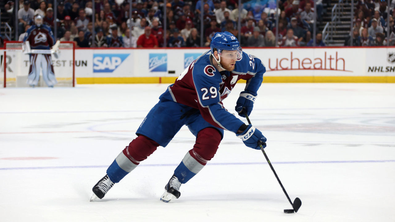 DENVER, COLORADO - JUNE 18: Nathan MacKinnon #29 of the Colorado Avalanche skates the puck into the offensive zone against the Tampa Bay Lightning in the first period of Game Two of the 2022 Stanley Cup Final at Ball Arena on June 18, 2022 in Denver, Colorado.