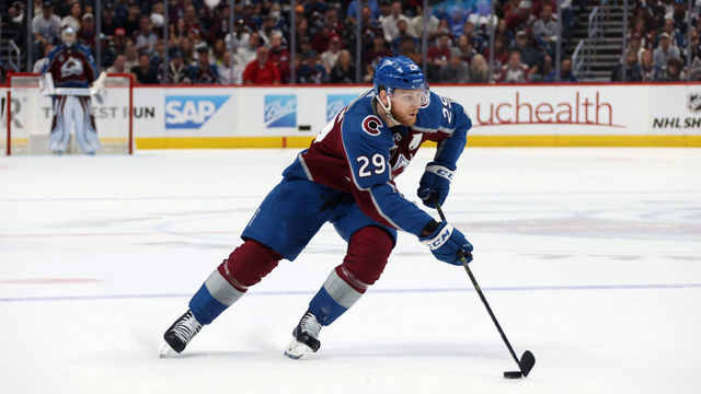 DENVER, COLORADO - JUNE 18: Nathan MacKinnon #29 of the Colorado Avalanche skates the puck into the offensive zone against the Tampa Bay Lightning in the first period of Game Two of the 2022 Stanley Cup Final at Ball Arena on June 18, 2022 in Denver, Colorado.