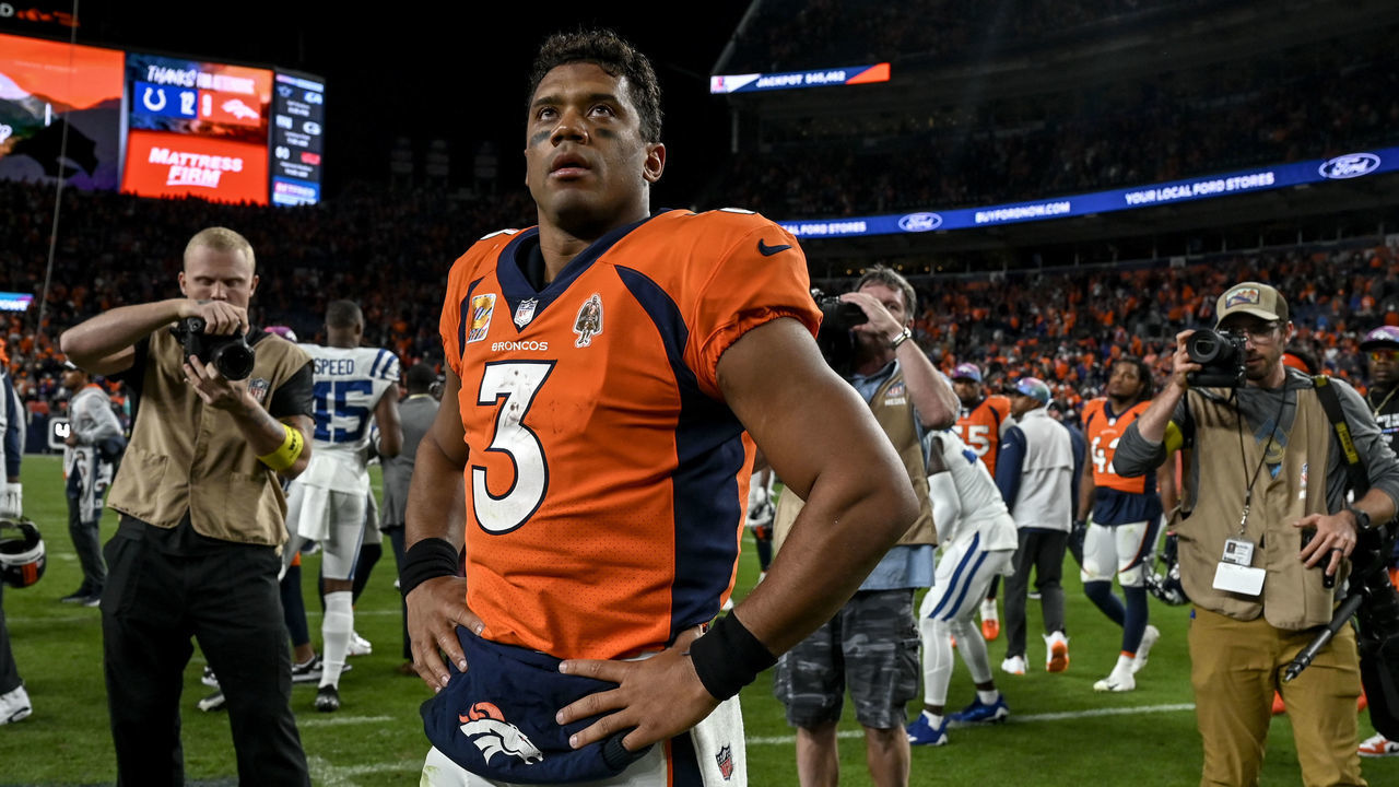 DENVER, CO - OCTOBER 6: Russell Wilson (3) of the Denver Broncos stands on the field after the second half of the Indianapolis Colts 12-9 overtime win at Empower Field at Mile High in Denver on Thursday, October 6, 2022.
