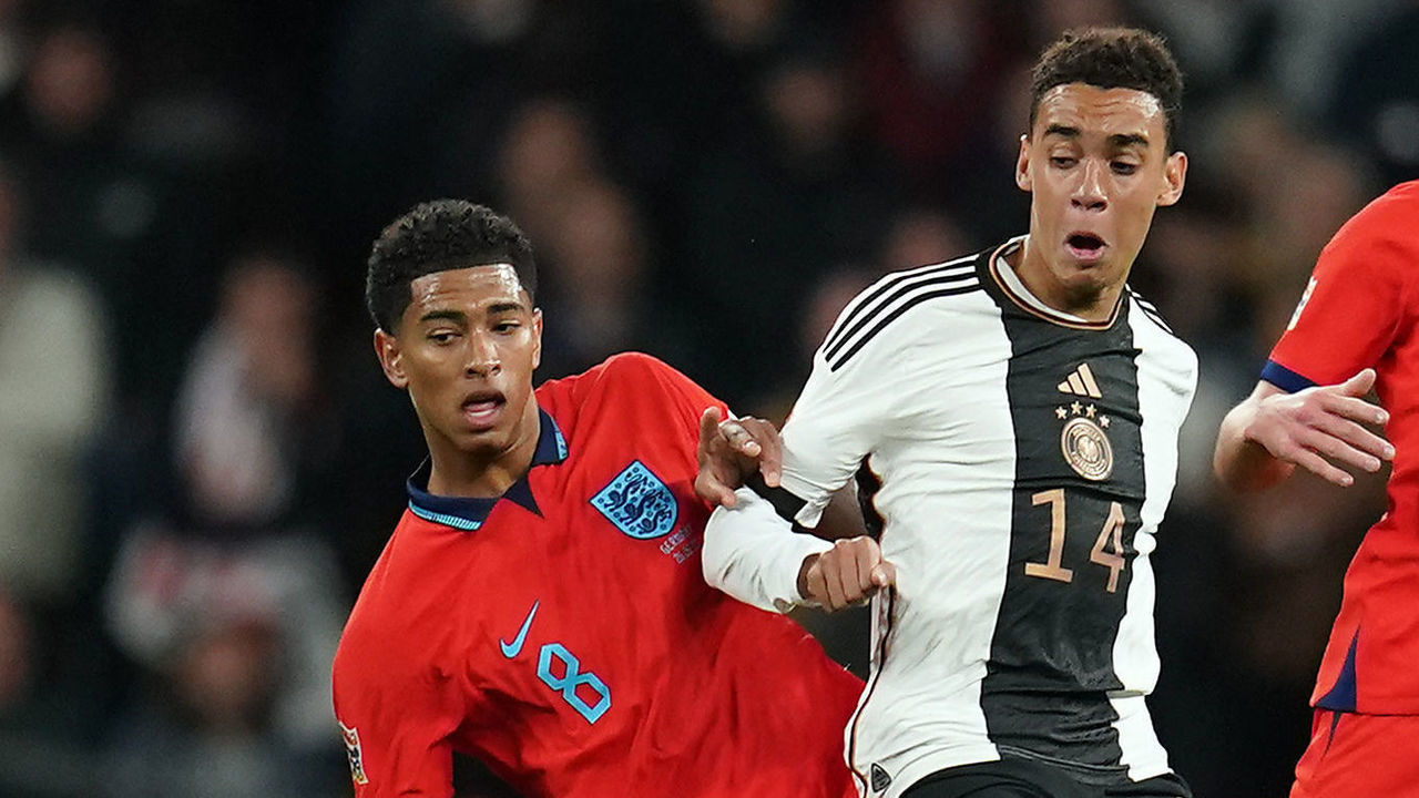 England's Jude Bellingham and Germany's Jamal Musiala during the UEFA Nations League match at Wembley Stadium, London. Picture date: Monday September 26, 2022.