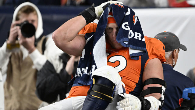 DENVER, COLORADO - OCTOBER 6: Denver Broncos offensive tackle Garett Bolles (72) is carted off the field after getting hurt at Empower Field on October 6, 2022 in Denver, Colorado. The hometown Denver Broncos lost 12 to 9 over the Indianapolis Colts in overtime during week 5 of the NFL season.