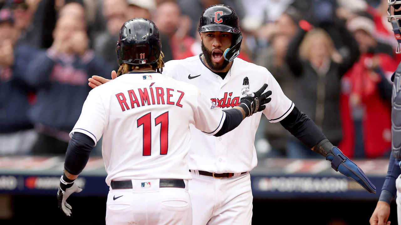 CLEVELAND, OHIO - OCTOBER 07: Jose Ramirez #11 of the Cleveland Guardians celebrates with Amed Rosario #1 after hitting a two RBI home run in the sixth inning against the Tampa Bay Rays during game one of the Wild Card Series at Progressive Field on October 07, 2022 in Cleveland, Ohio.