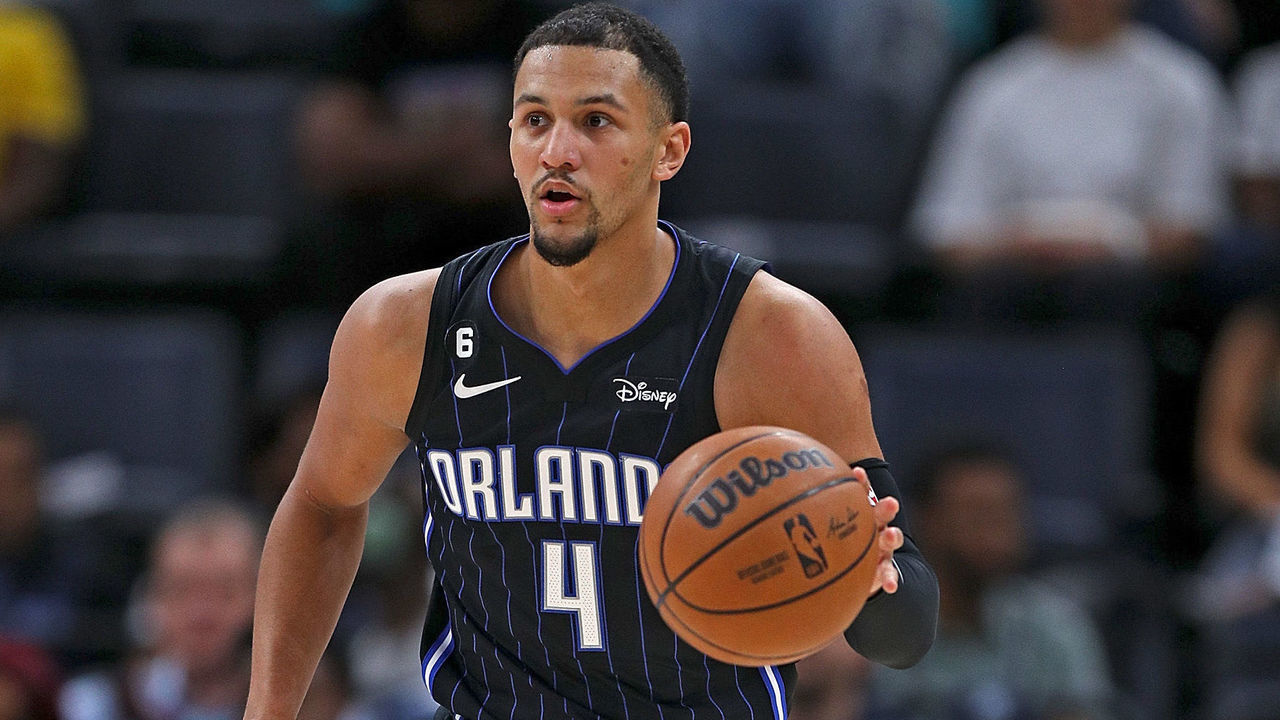 MEMPHIS, TENNESSEE - OCTOBER 03: Jalen Suggs #4 of the Orlando Magic brings the ball up court against the Memphis Grizzlies during a preseason game at FedExForum on October 03, 2022 in Memphis, Tennessee.