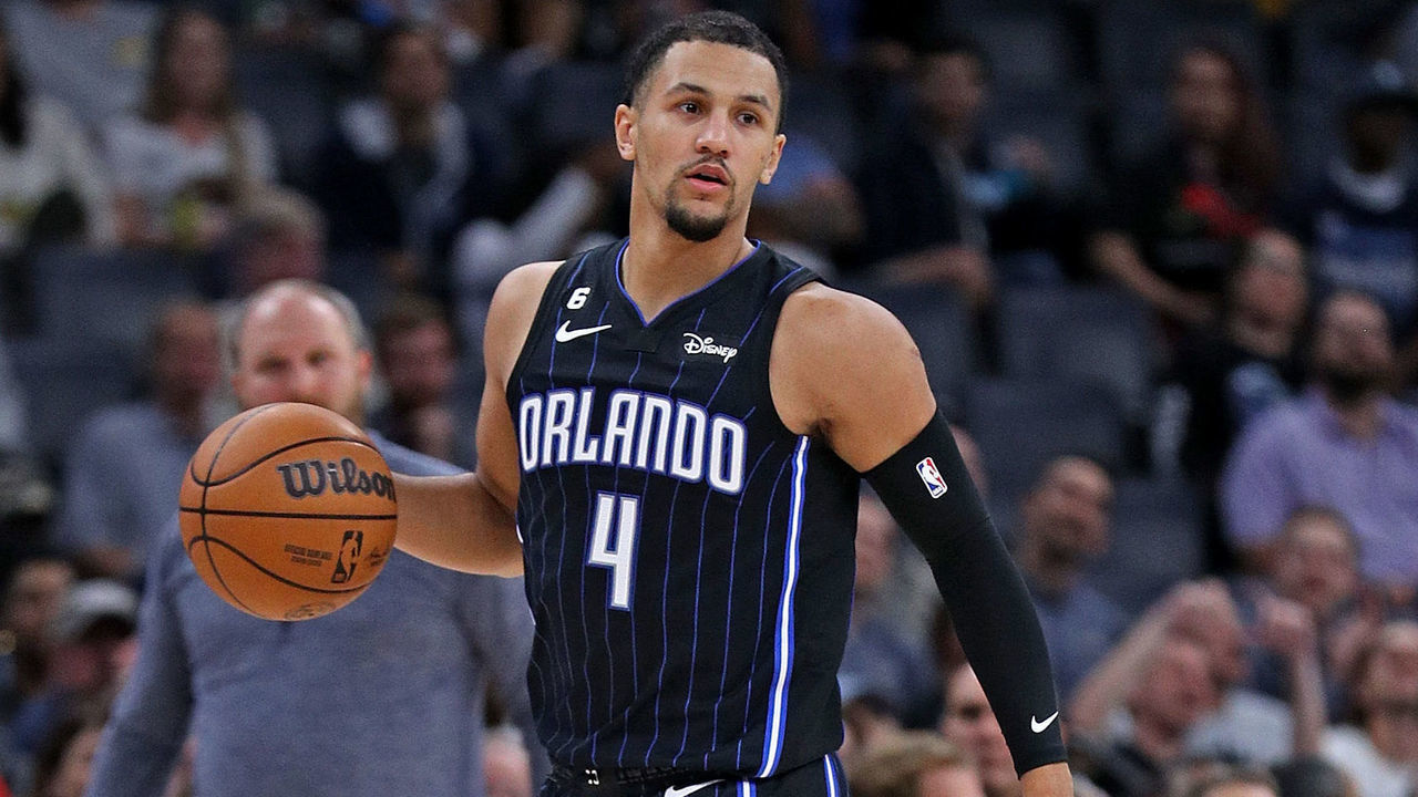 MEMPHIS, TENNESSEE - OCTOBER 03: Jalen Suggs #4 of the Orlando Magic brings the ball up court against the Memphis Grizzlies during a preseason game at FedExForum on October 03, 2022 in Memphis, Tennessee.